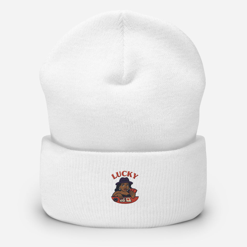 White beanie with a cartoon character and 'Lucky' text on a white background