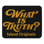 Black mouse pad with gold text 'WHAT IS TRUTH? Island Originals' on a white background