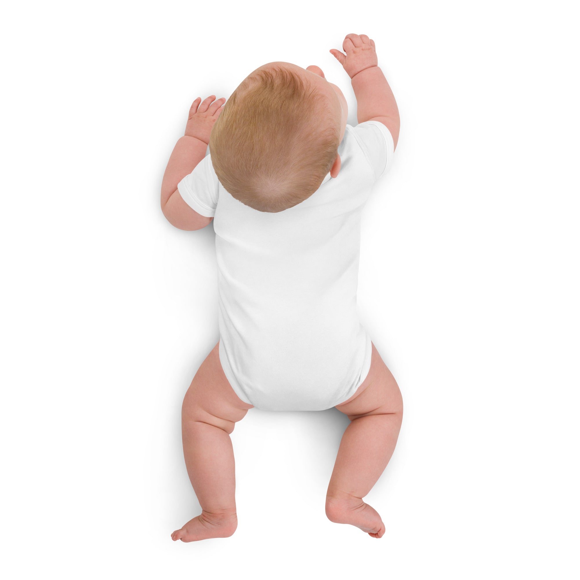 Baby in a white onesie on a white background