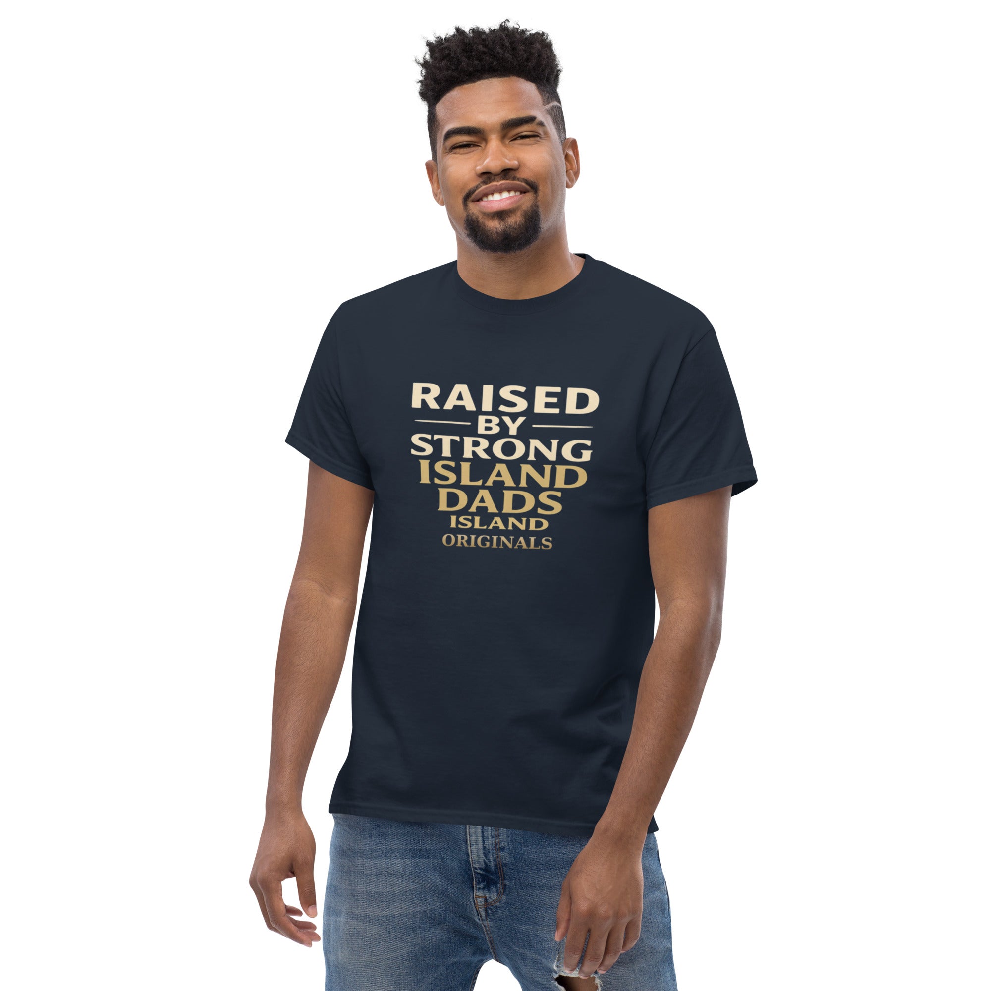 Man wearing a navy blue t-shirt with text, standing against a white background