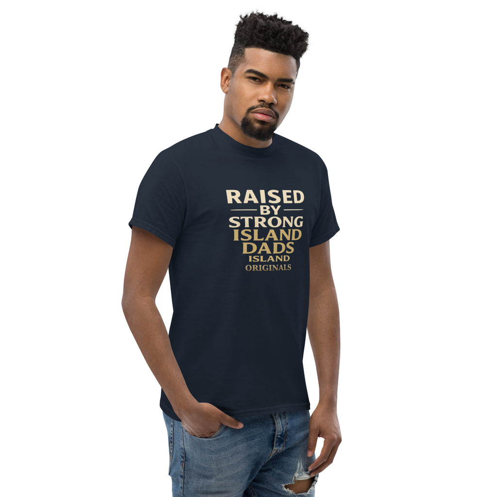 Man wearing a navy blue t-shirt with text standing against a white background
