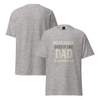 Gray t-shirt with text 'No Islander Does It Like Dad' on a white background