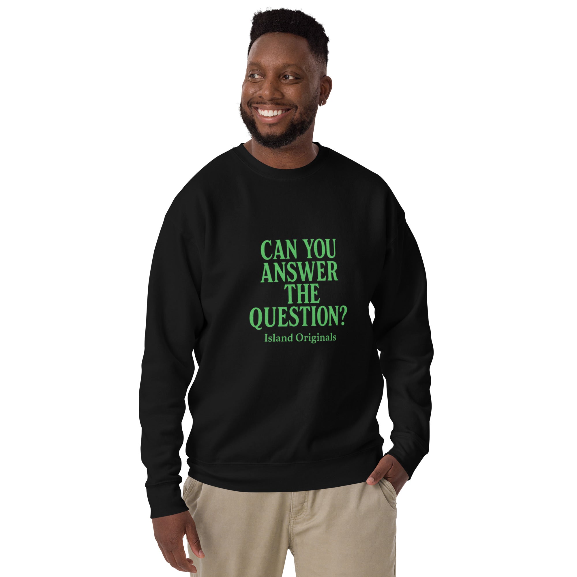 Person wearing a black sweatshirt with green text on a white background