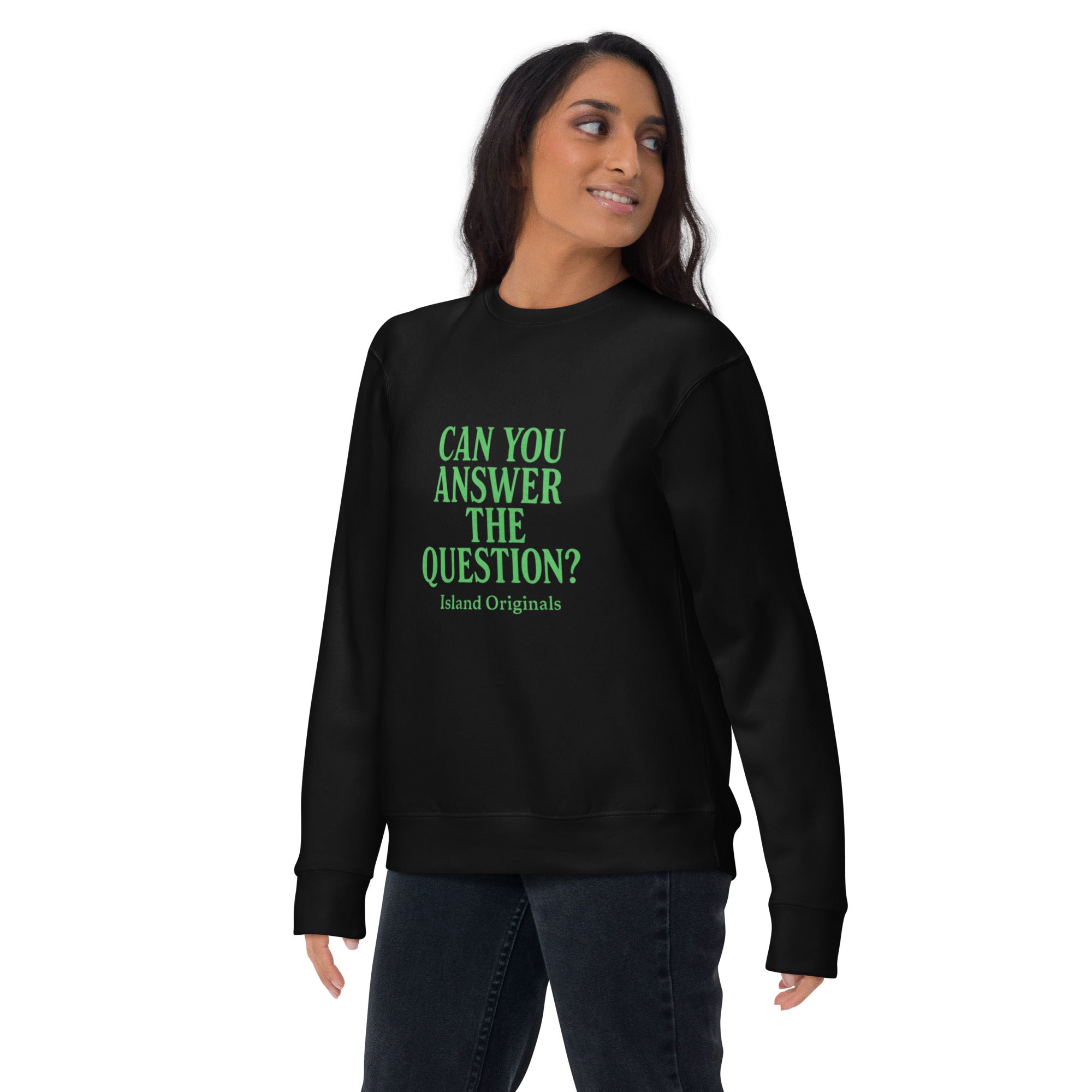 Person wearing a black sweatshirt with green text on a white background
