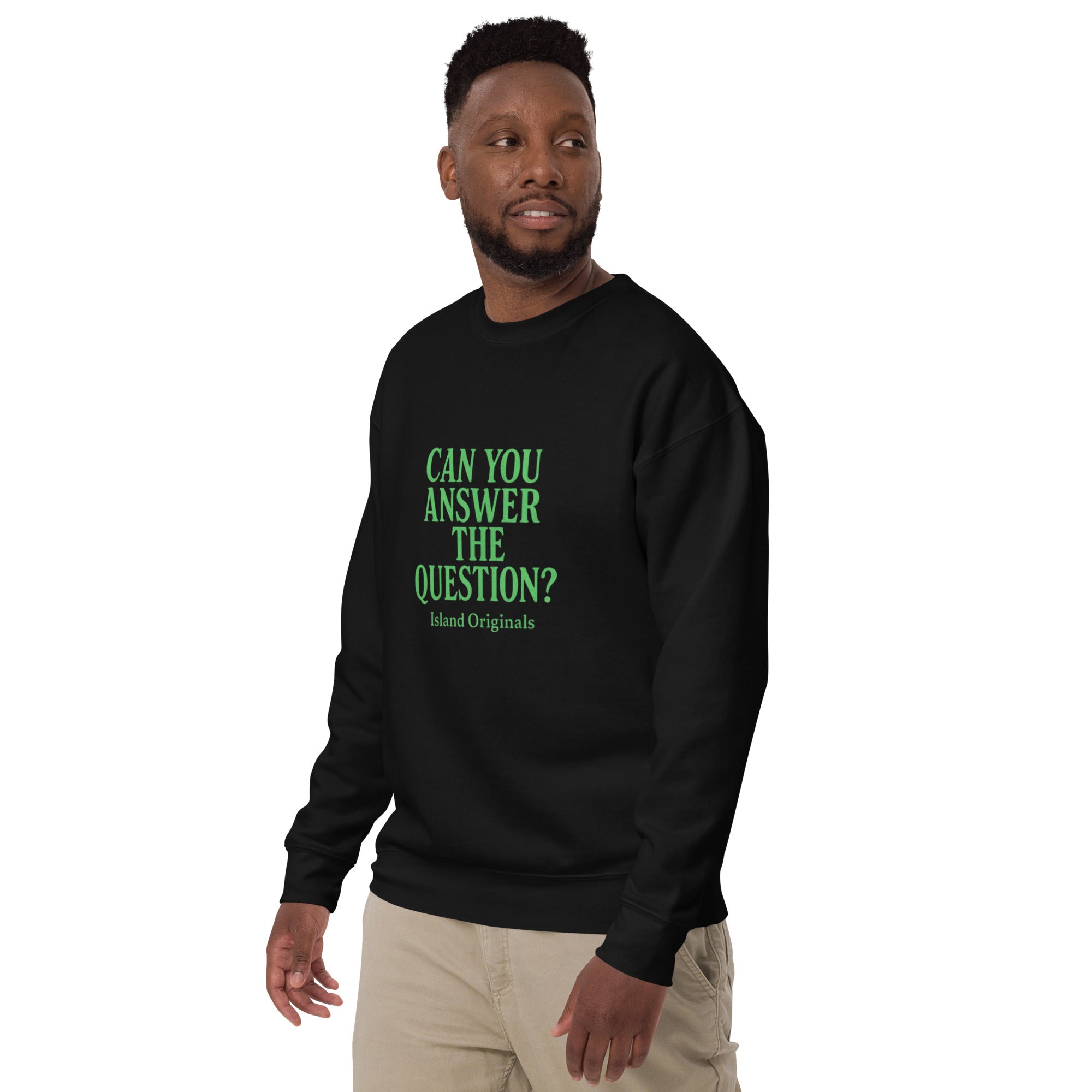 Person wearing a black sweatshirt with green text on a white background