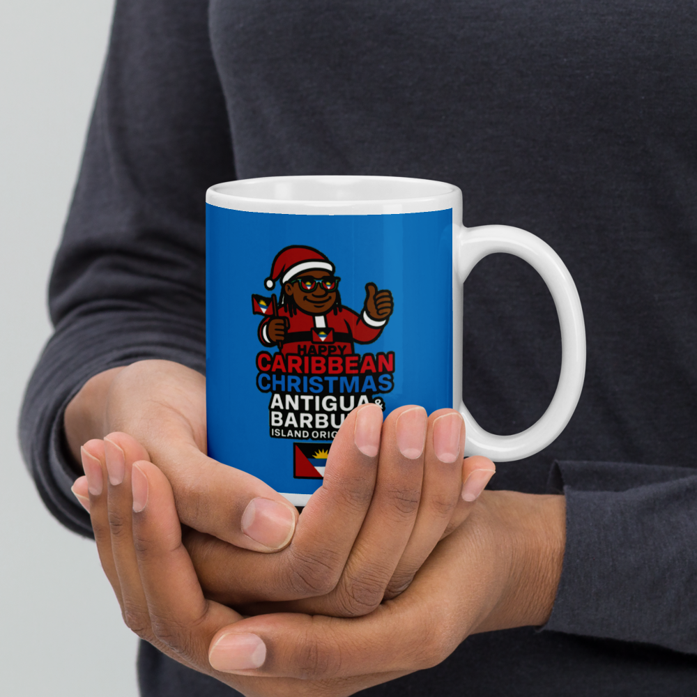 Person holding a mug with a colorful design featuring a character and text.